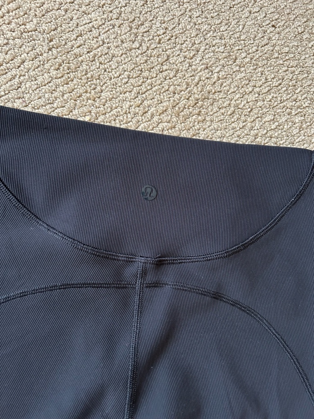 Lululemon short tights size 8, black. Excellent condition. Inside pocket
